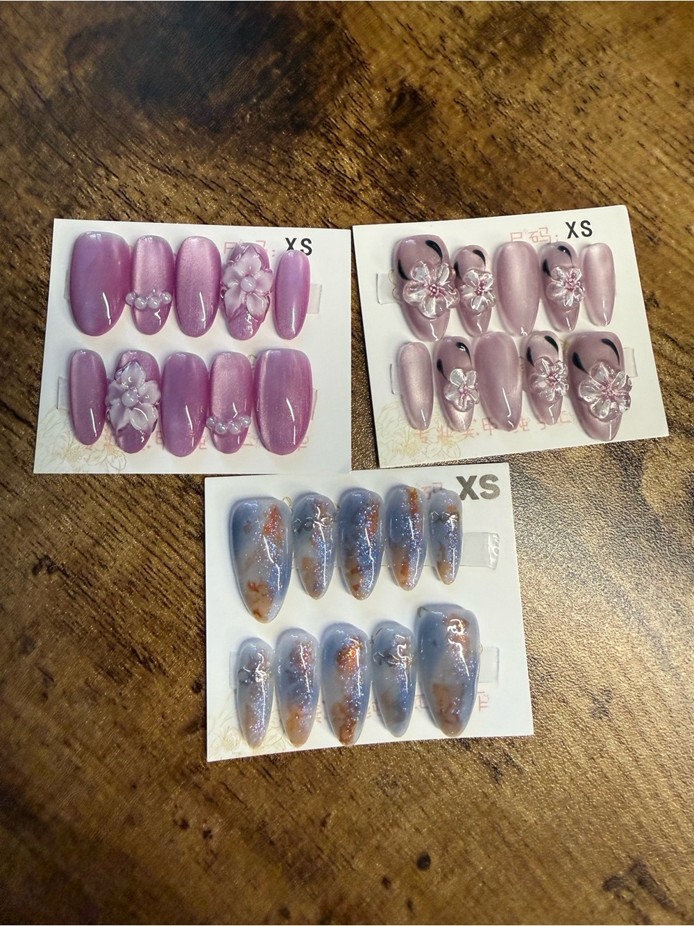 3 Press-On Nail Set Trio in Xsmall – Pink & Lilac Floral and Blue Marble Styles
